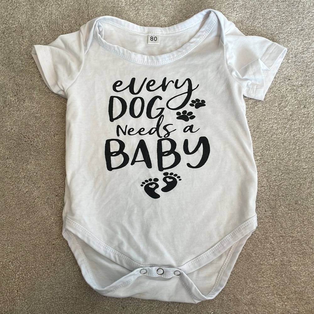 Every dog needs a baby onesie